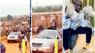 “ZAZOO na king of Trenches” – Reactions as Portable returns to Nigeria and give back by spraying money in a street (VIDEO)
