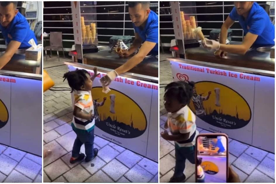 “Just like his Dad, No room for stress” – Reactions as Davido son walks away as ice-cream man plays games with him