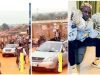 “ZAZOO na king of Trenches” – Reactions as Portable returns to Nigeria and give back by spraying money in a street (VIDEO)