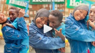 “He won’t cheat on her” – Nigerian lady carries her small-sized lover like baby (Video)